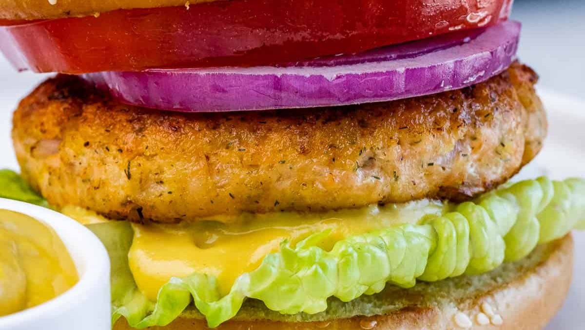 Salmon Burger with Honey Mustard Sauce and Cole Slaw (can sub Sweet Potato Fries)