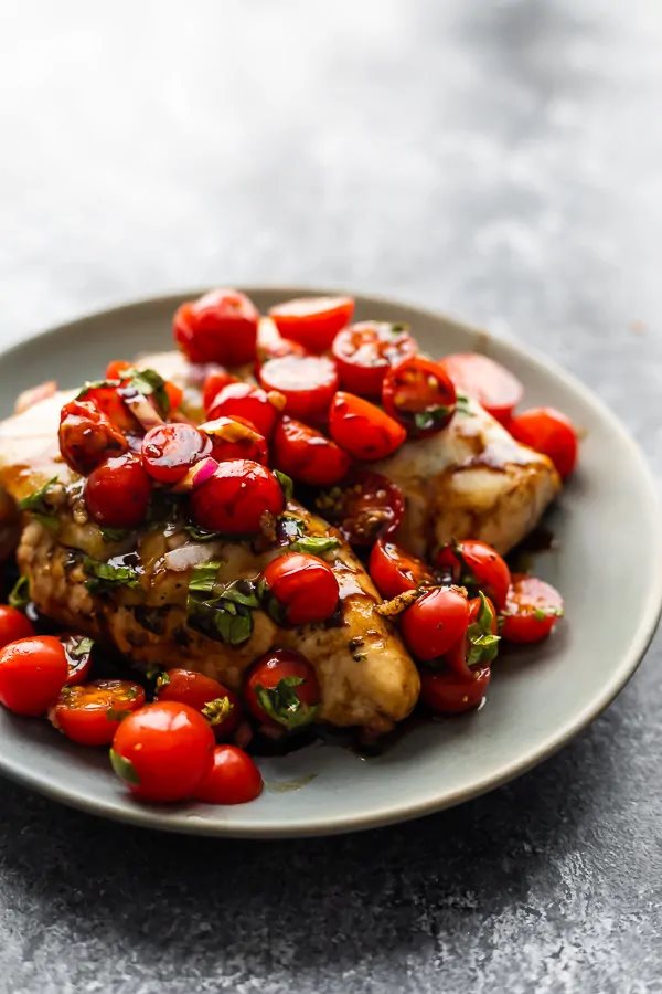 Baked Bruschetta Chicken over Spiralized zucchini noodles