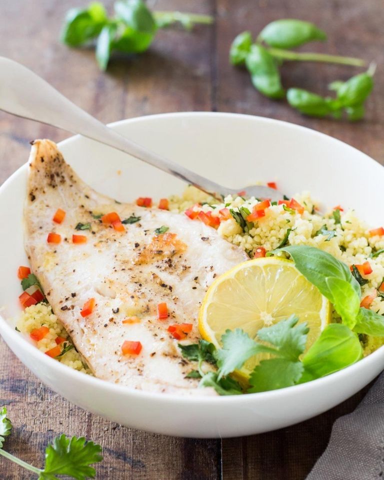 Lemon Pepper Haddock (Wild Caught) over Cauliflower veggie rice, with Baked lightly seasoned veggie blend.